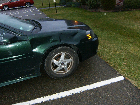 So that is a rather large dent in the front 
fender.