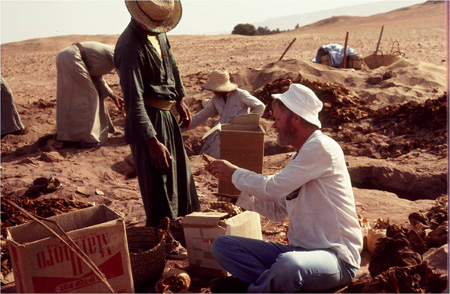 Dr. Melbye Sorting Bones in the Field