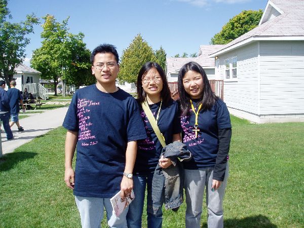 Taking a picture with my sisters. Of course! I am the best looking one out of them all..jkjk